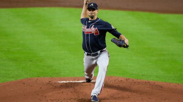 Charlie Morton #50 of the Atlanta Braves pitches in the first inning during Game 1 of the 2021 World Series between the Atlanta Braves and the Houston Astros at Minute Maid Park.