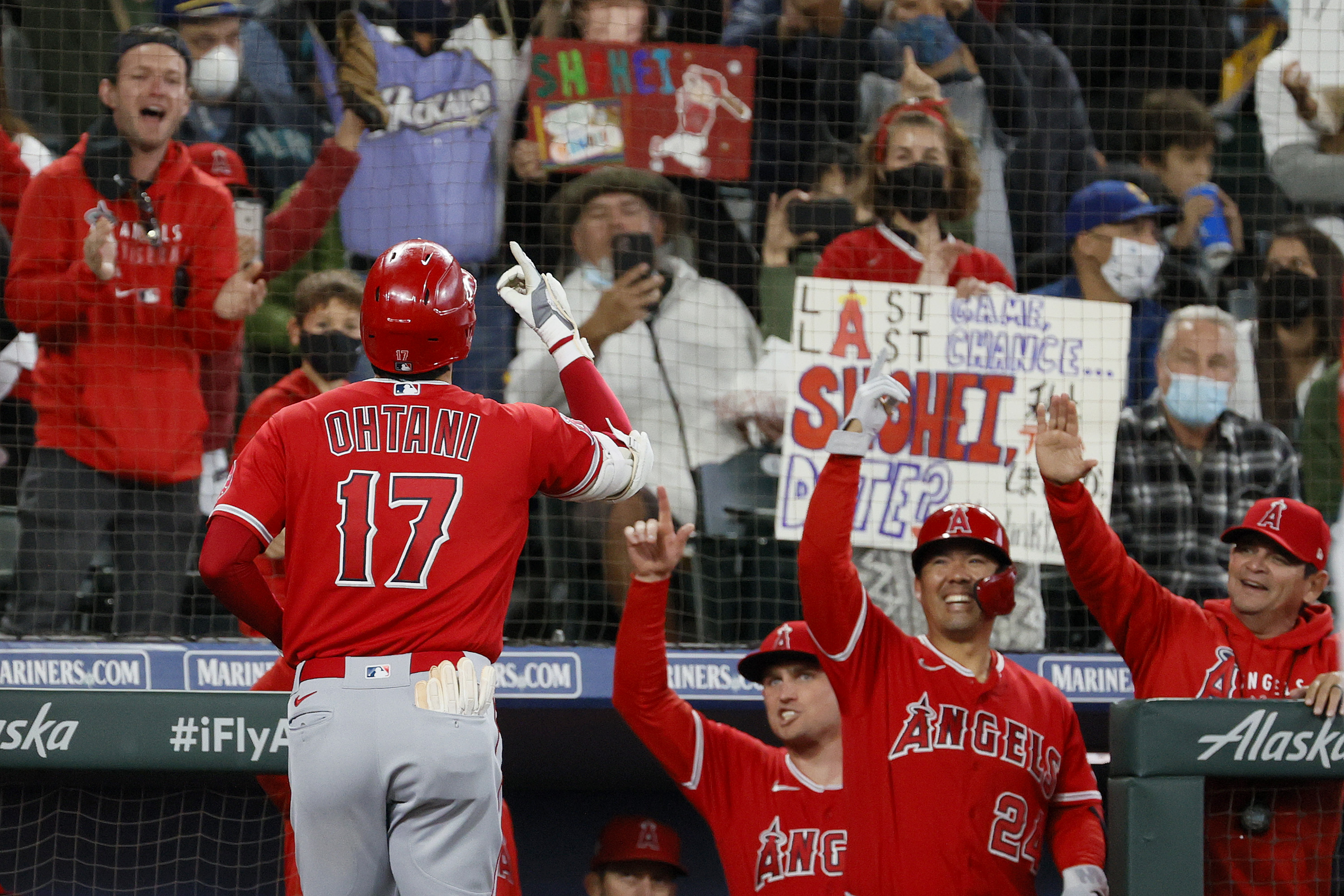 Mitch Haniger of the Seattle Mariners reacts after hitting a two-run single  in the eighth inning of a game against the Los Angeles Angels on Oct. 2,  2021, at T-Mobile Park in