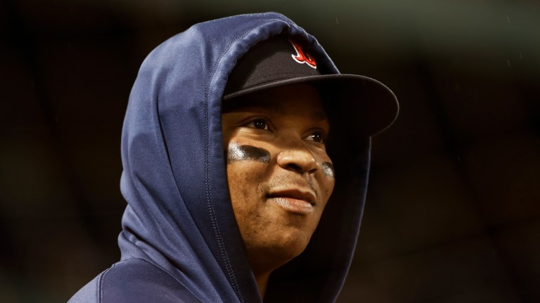 Rafael Devers of the Boston Red Sox looks on against the Tampa Bay Rays during the seventh inning at Fenway Park.
