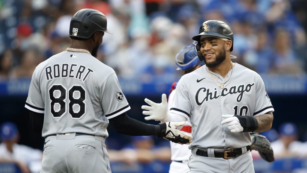 Luis Robert Jr. #88 of the Chicago White Sox reacts after hitting