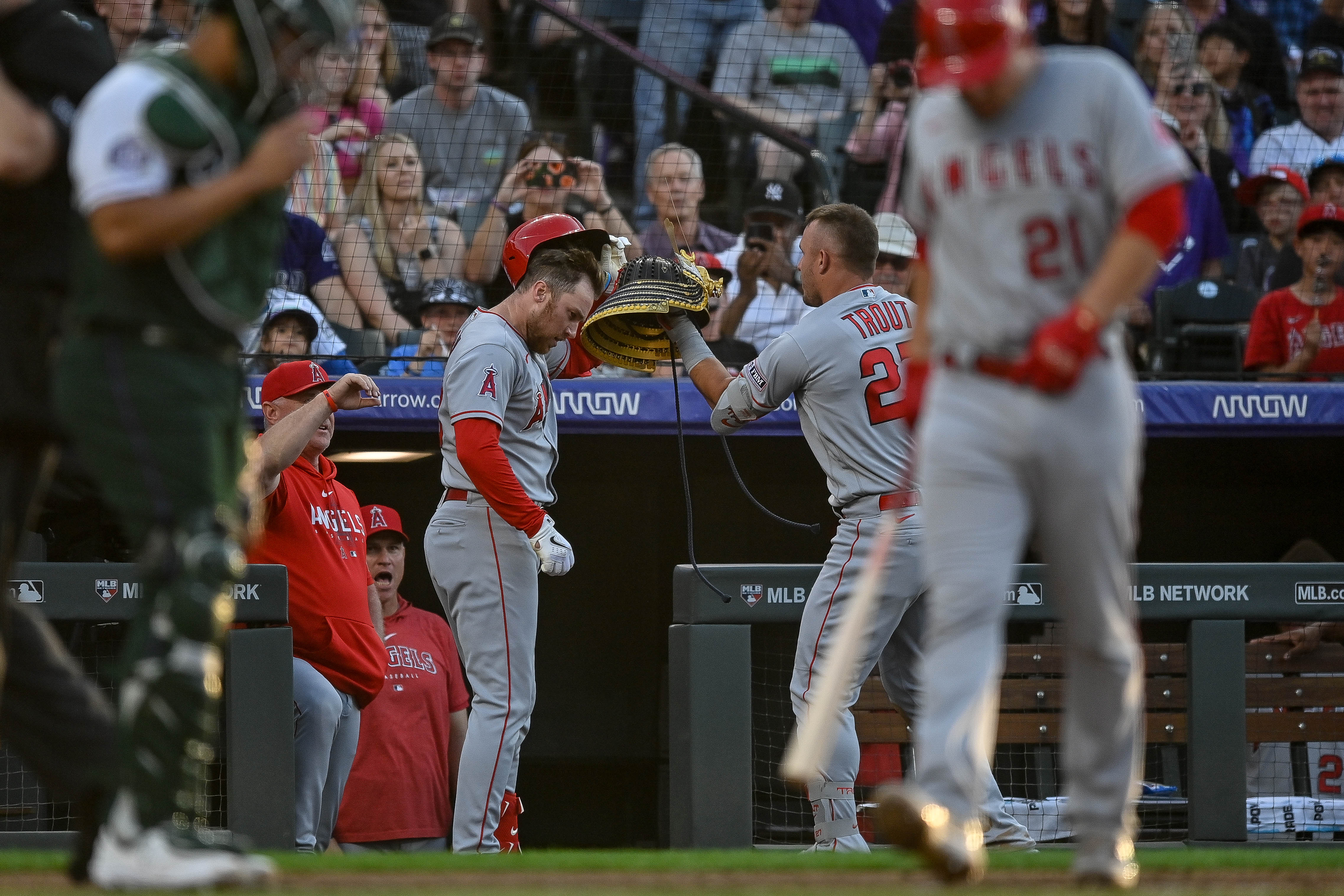 Mike Trout of the Los Angeles Angels prepares to put on a samurai