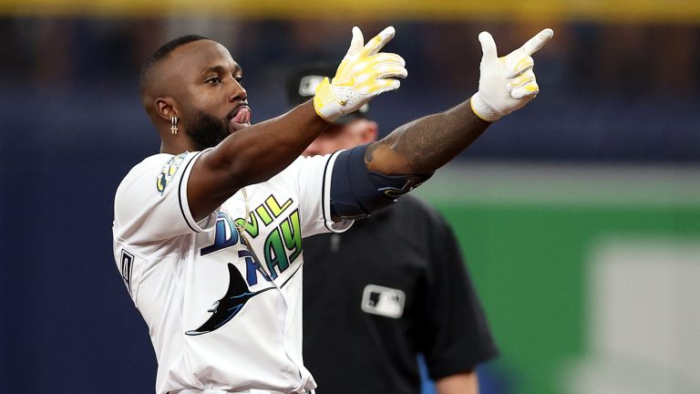 Randy Arozarena of the Tampa Bay Rays reacts after hitting a double in the third inning against the Texas Rangers during Game One of the Wild Card Series at Tropicana Field.