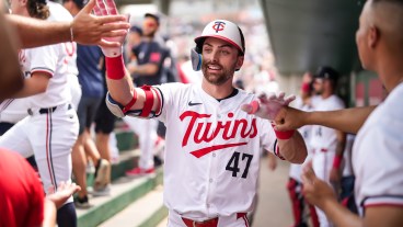 Edouard Julien of the Minnesota Twins celebrates during a spring training game against the Boston Red Sox at the Lee County Sports Complex.