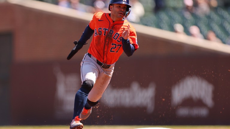 Jose Altuve #27 of the Houston Astros runs the bases after a single by Alex Bregman #2 (not pictured) against the Chicago Cubs during the first inning at Wrigley Field.