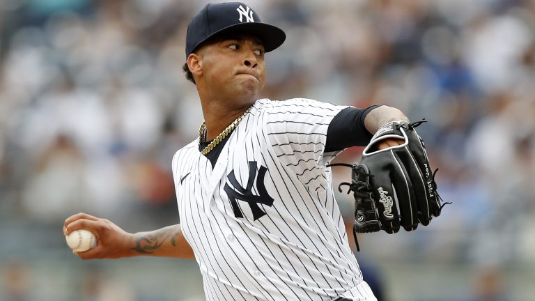 Luis Gil of the New York Yankees pitches during the second inning against the Seattle Mariners at Yankee Stadium.