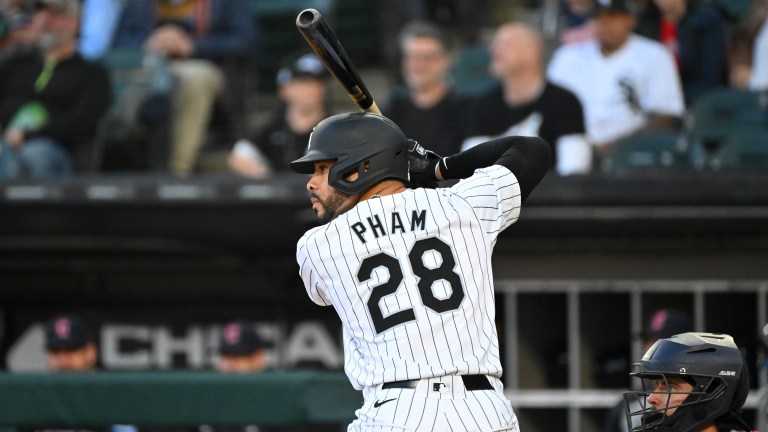Tommy Pham #28 of the Chicago White Sox waits for a pitch during a game against the Cleveland Guardians at Guaranteed Rate Field.