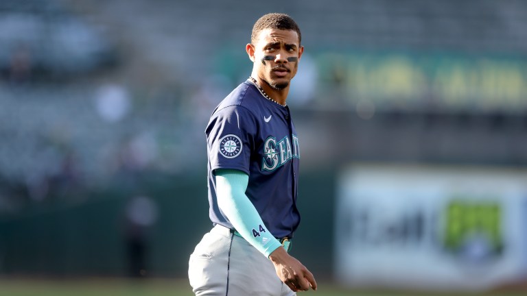 Julio Rodríguez of the Seattle Mariners walks to the dugout.