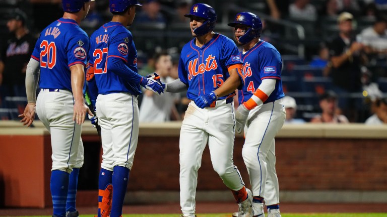 Tyrone Taylor #15 of the New York Mets celebrates with Pete Alonso #20, Mark Vientos #27 and Francisco Alvarez #4 after hitting a three RBI home run in the sixth inning during the game between the New York Yankees and the New York Mets.