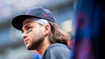 Bo Bichette #11 of Toronto Blue Jays looks on from the dugout before playing the Houston Astros in their MLB game at the Rogers Centre.