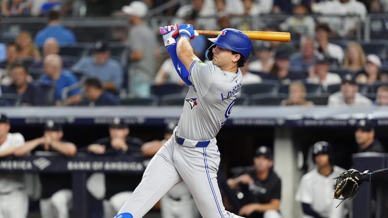 Toronto Blue Jays Left Fielder Joey Loperfido (9) hits a triple during the first inning of the Major League Baseball game between the Toronto Blue Jays and New York Yankees at Yankee Stadium.