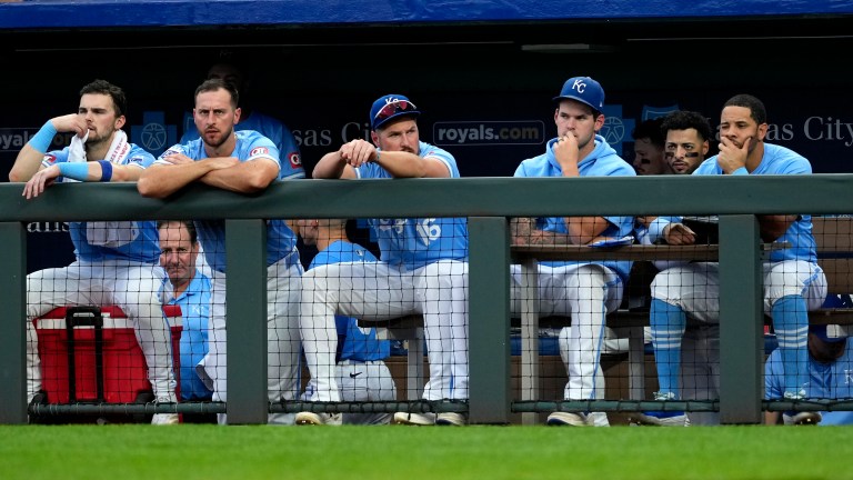 KANSAS CITY, MISSOURI - SEPTEMBER 21: Members of the Kansas City Royals watch from the dugout in the ninth inning against the San Francisco Giants at Kauffman Stadium on September 21, 2024 in Kansas City, Missouri. The Royals lost 9-0. (Photo by Ed Zurga/Getty Images)