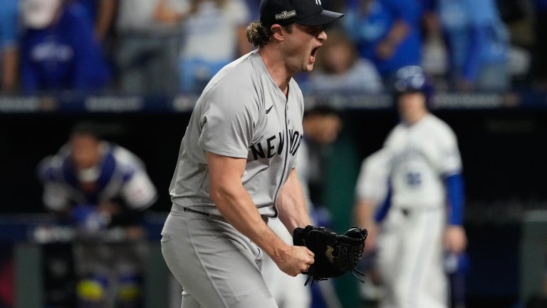 Gerrit Cole of the New York Yankees reacts during the seventh inning against the Kansas City Royals during Game Four of the Division Series at Kauffman Stadium.